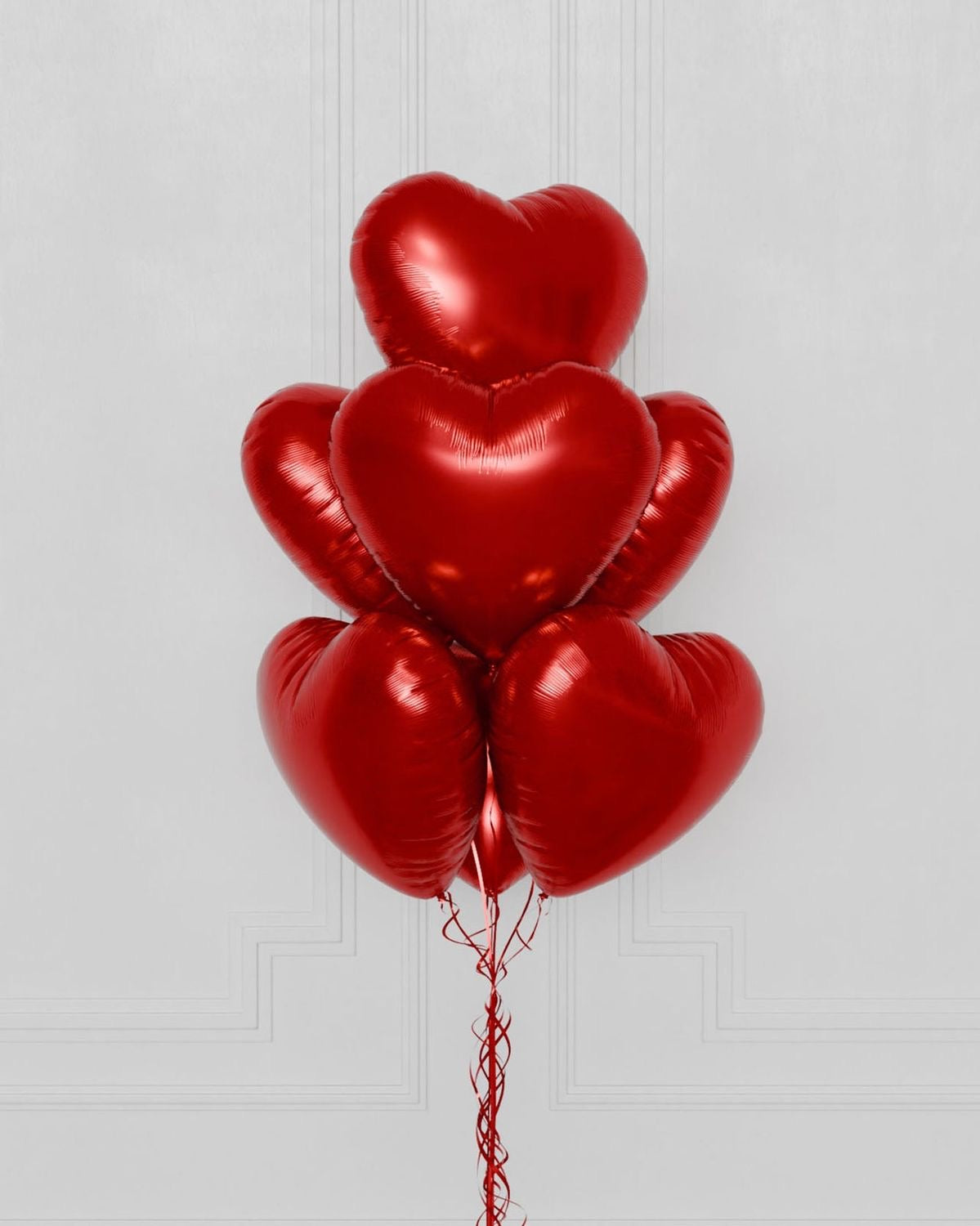Red heart shaped balloons bouquet for Valentine’s Day romantic gift in Houston
