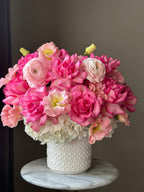 Bouquet of pink and white flowers.